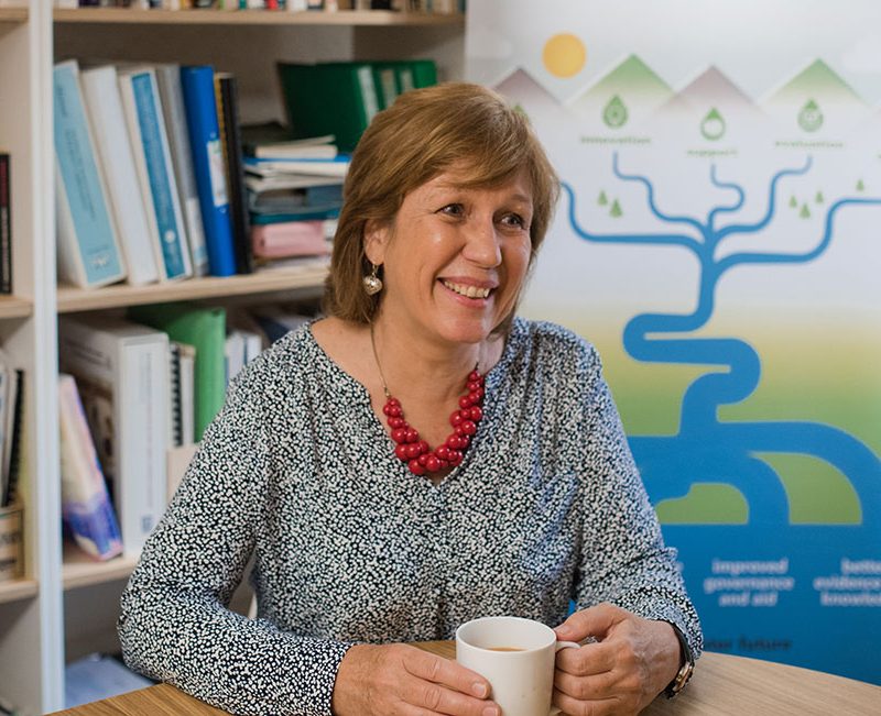 Dorcas sat at her desk