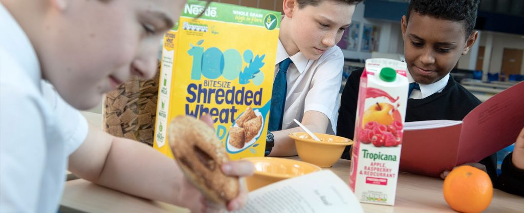 Group of students enjoy breakfast