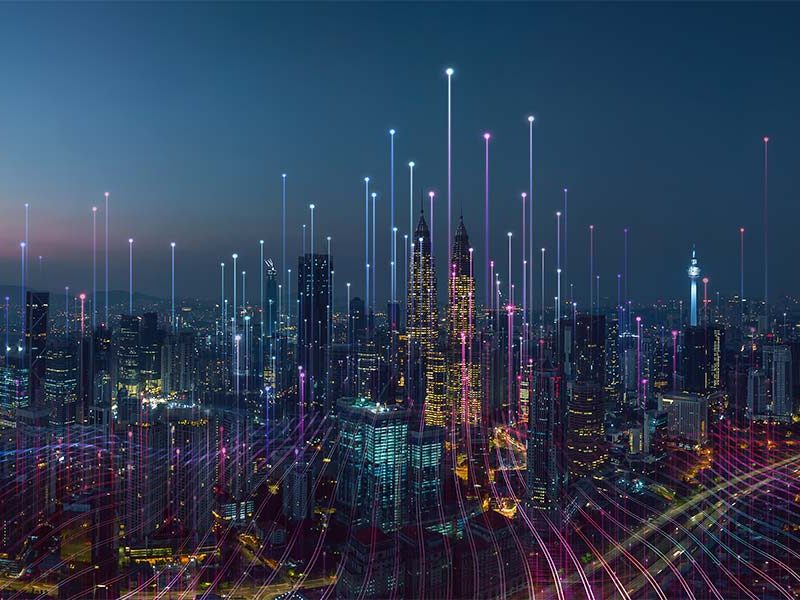 Cityscape with lines demonstrating technology