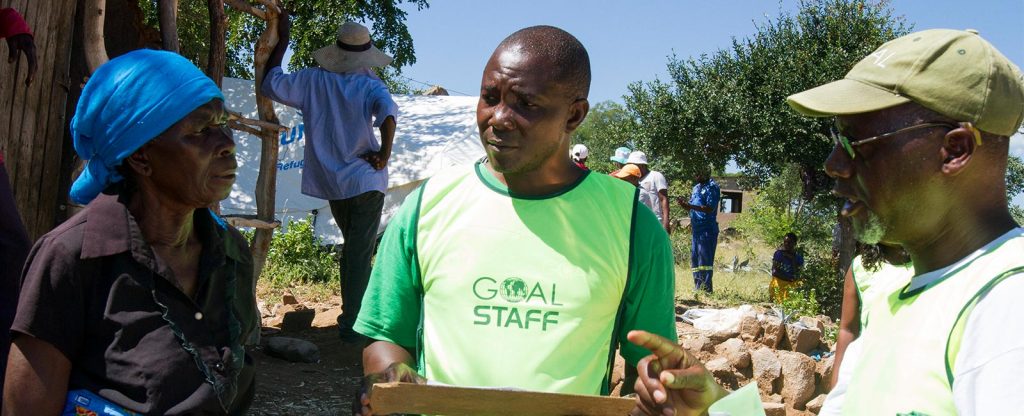 GOAL worker speaking to those in need