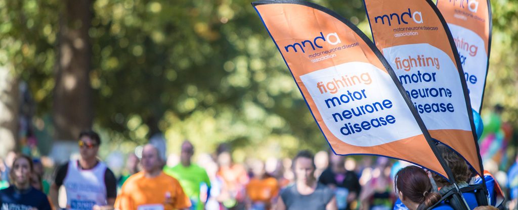Fundraising event with MNDA flags