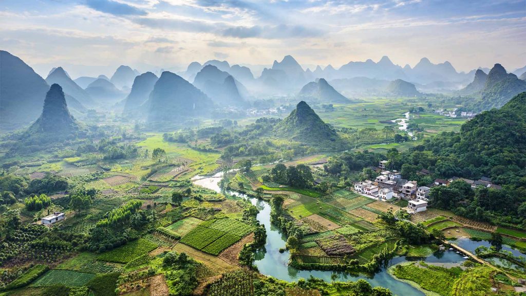 Green landscape with river running through