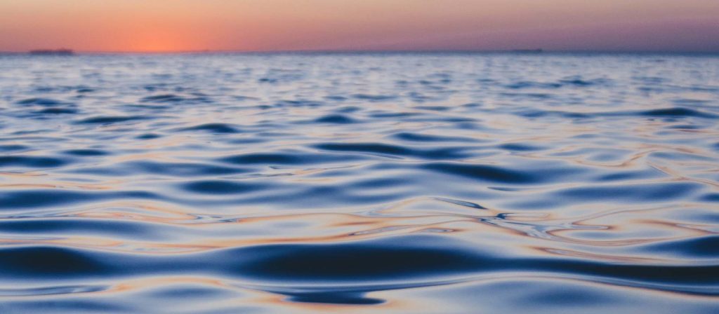 Sun setting over the ocean