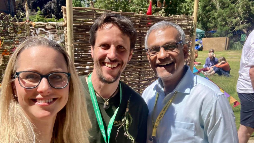 Dom, Zoe and a delegate at Growing Positive Change