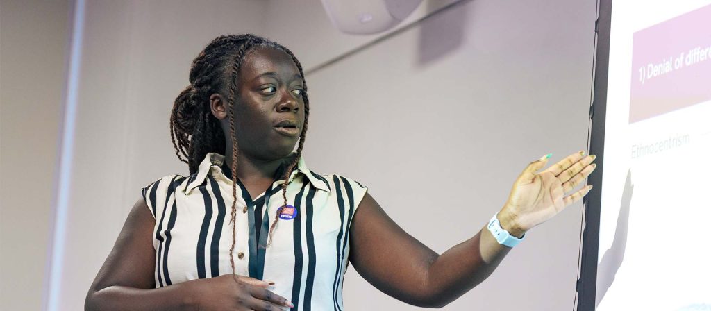 Grace speaking at the Race Summit