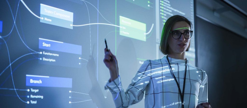 Woman presenting to team