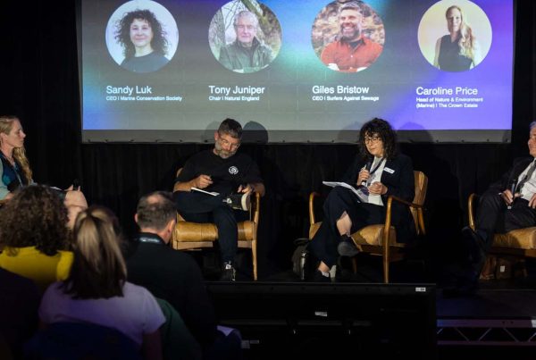 Participants on stage at Blue Earth Summit 2025